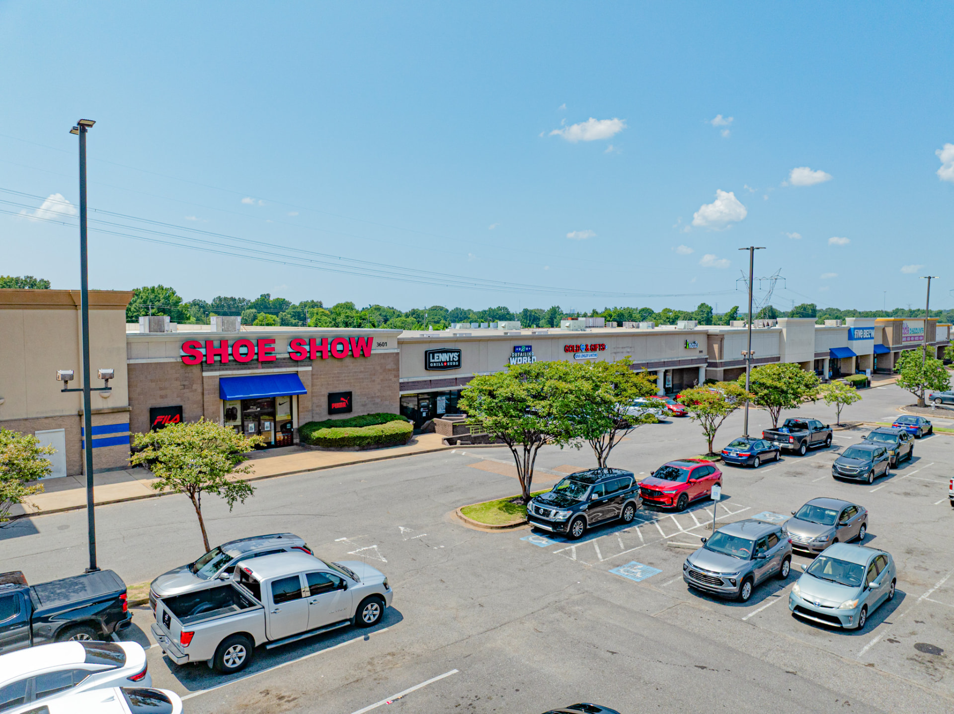 Shoe Show and Lennys Grill & Subs shop fronts at Cross Creek